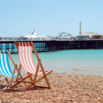 deck chairs on the beach Brigton England